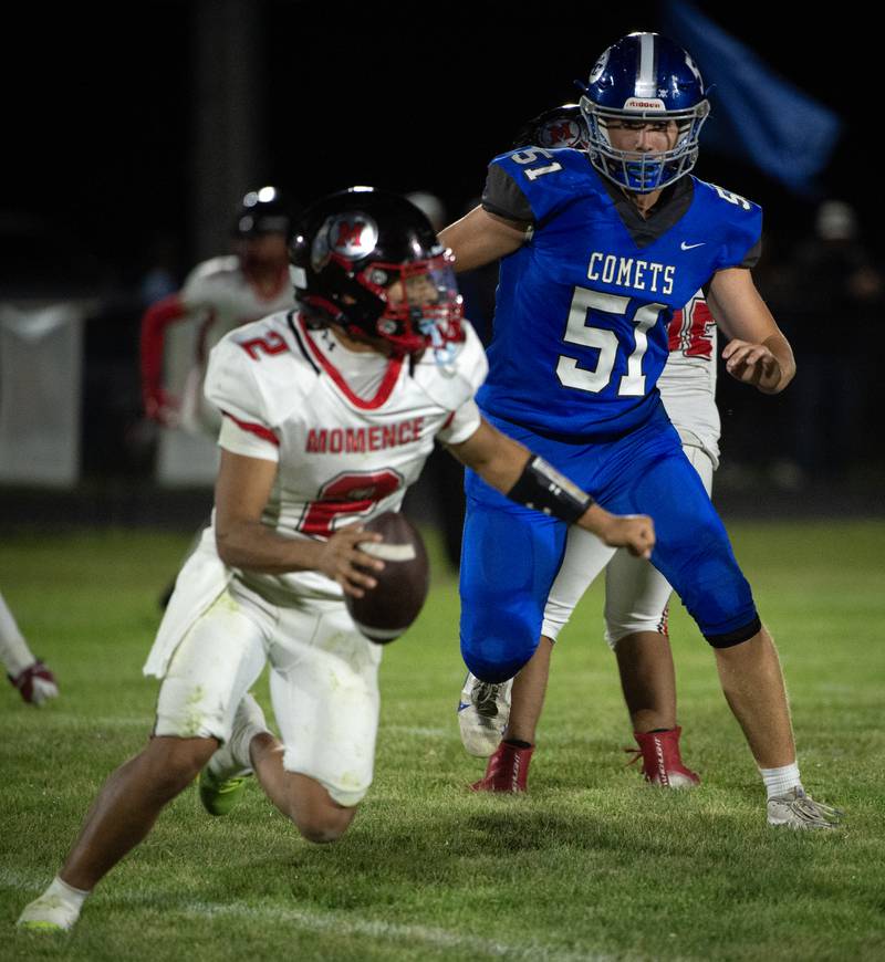 Clifton Central's Jake Thompson puts pressure on Momence's Erick Castillo, left, in a game on Friday, September 5, 2025.