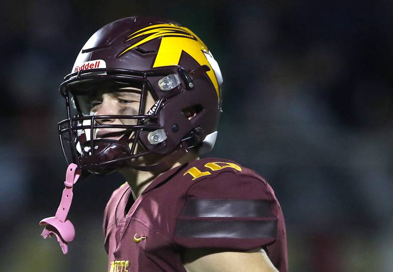 Richmond-Burton's Max Loveall battles his emotions as he walks off the field after Richmond-Burton lost to St. Viator in a IHSA Class 4A first round playoff football game Friday, Oct. 27, 2023, at Richmond-Burton High School in Richmond.