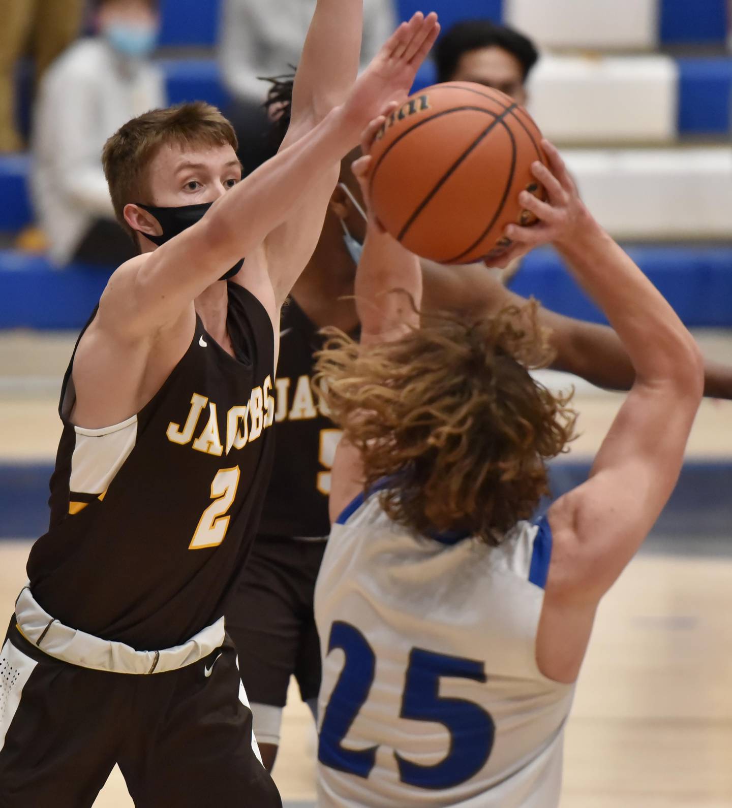 Jacobs' Robert Pennel pressures Burlington Central's Zac Schmidt in the Fox Valley Conference semifinal boys basketball game in Burlington Thursday night, March 11, 2021.