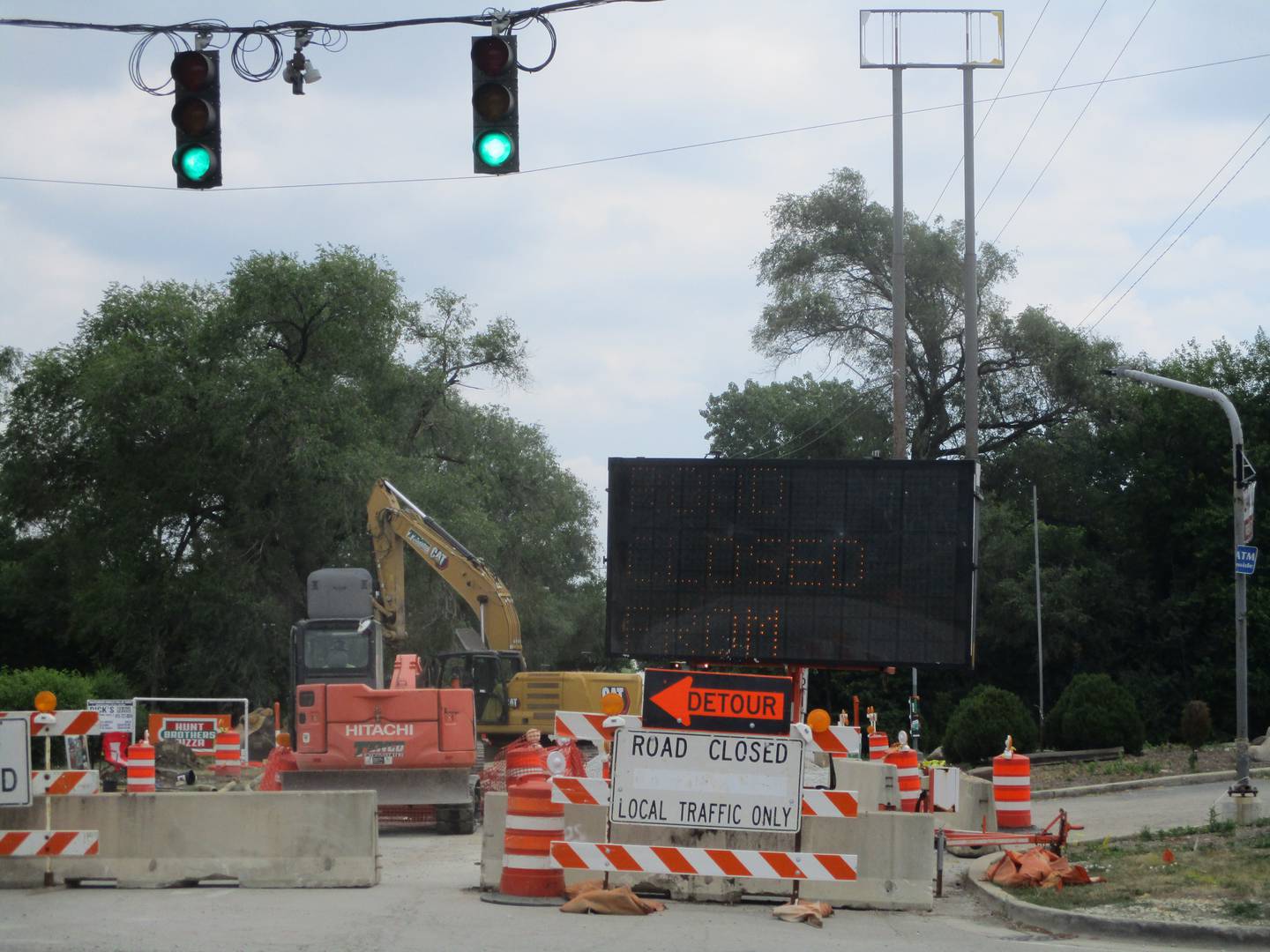 New Lenox Road is closed on both sides of Briggs Street during infrastructure construction to bring city water and sewer service to the future Love's truck stop in Joliet on July 8, 2025.