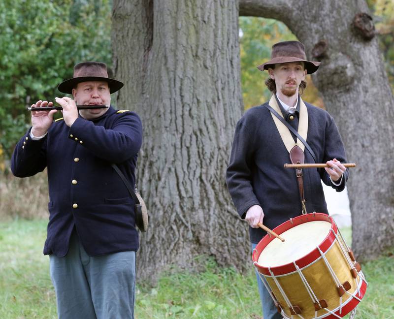 Steve Skalak, of Plainfield and his brother, Kevin, of Lombard play field music as fife & drum with the 104th Illinois during Hainesville’s Civil War Encampment & Battle at the Northbrook Sports Club on October 21st in Hainesville. 
Photo by Candace H. Johnson for Shaw Local News Network