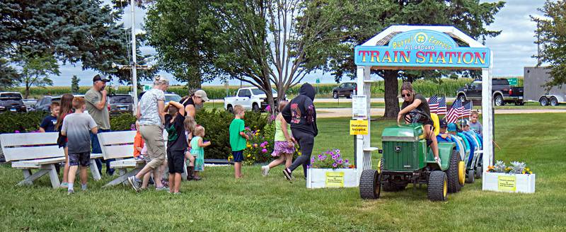 Kids await their turn to take a spin Saturday, July 29, 2023 on the Lee County 4H fair train at the Amboy fairgrounds.