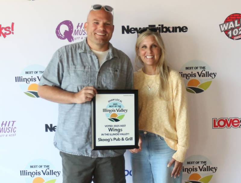 Blake Frund and Kelly Waters with Skoogs Pub and Grill, pose for a photo during the second annual Best of the Illinois Valley event on Thursday at the Auditorium Ballroom in La Salle.