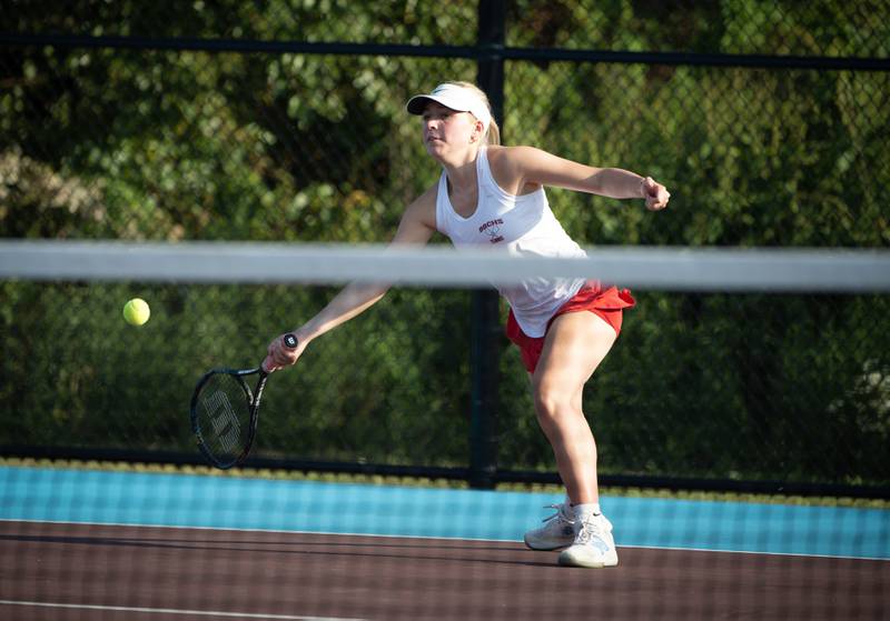 Bradley-Bourbonnais' Haley O'Malley makes a return hit in a doubles match against Kankakee on Wednesday, September 10, 2025.