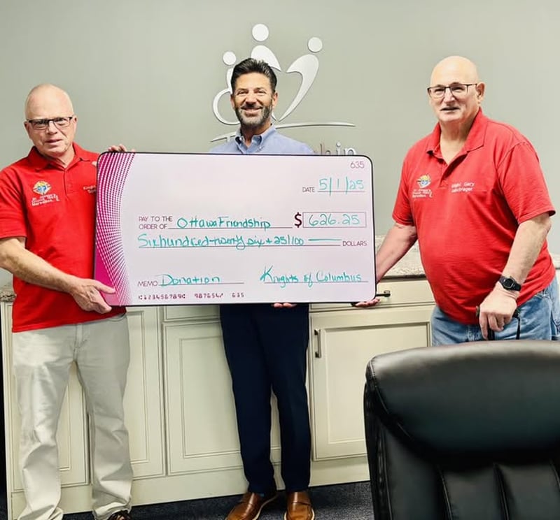 Ottawa Friendship House received a visit from the Marseilles Knights of Columbus to deliver donation of $626.25 raised during its annual Tootsie Roll Drive.