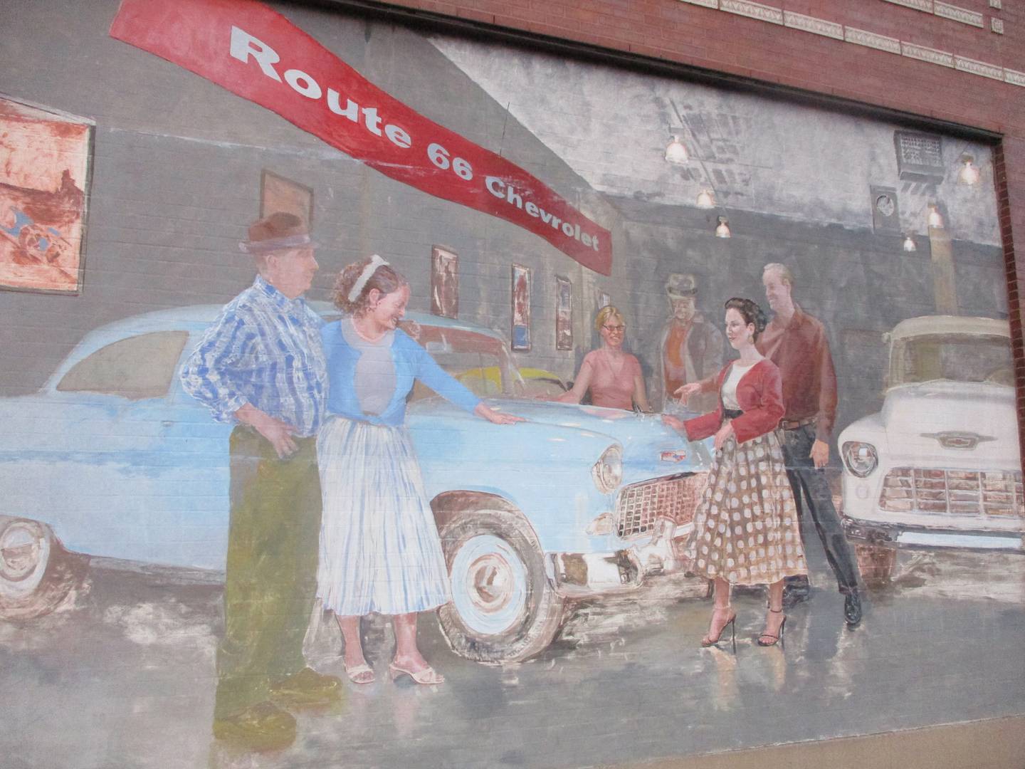 A mural commemorating the building's history as a Chevy dealership is seen on the wall of the city of Joliet garage at 402 N. Chicago St. Aug. 5, 2025