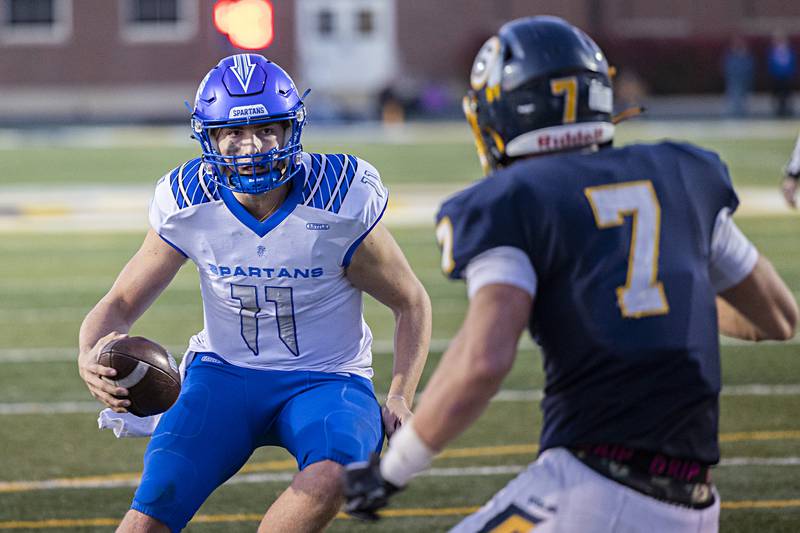 St. Francis QB Alessio Milivojevic crosses the end zone for a TD against Sterling Saturday, Nov. 4, 2023 in a class 5A playoff game in Sterling.