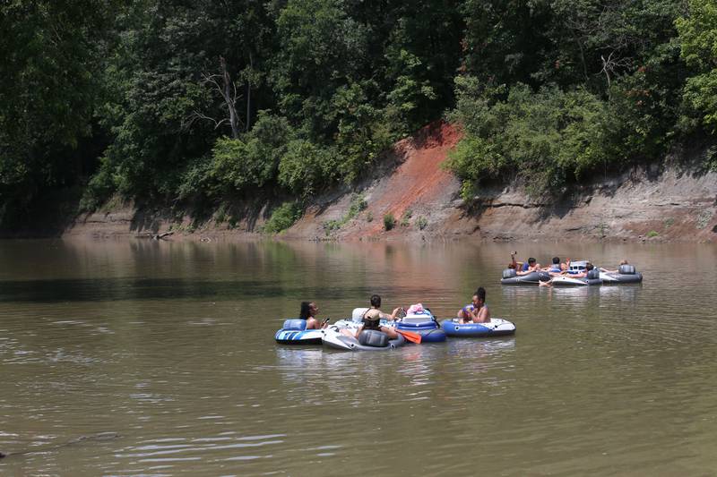 A group of rafters with River Bum Rafting float on the Vermilion River to cool off in the heat on Monday, July 15, 2024 at the boat launch in Oglesby. Temperatures climbed into the lower 90's for much of the day.