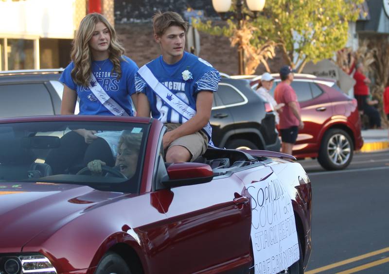 Princeton High School sophmore court attendants Maegan Dupreez and Jack Heaton ride during the Homecoming parade on Thursday, Oct. 3, 2024 downtown Princeton.