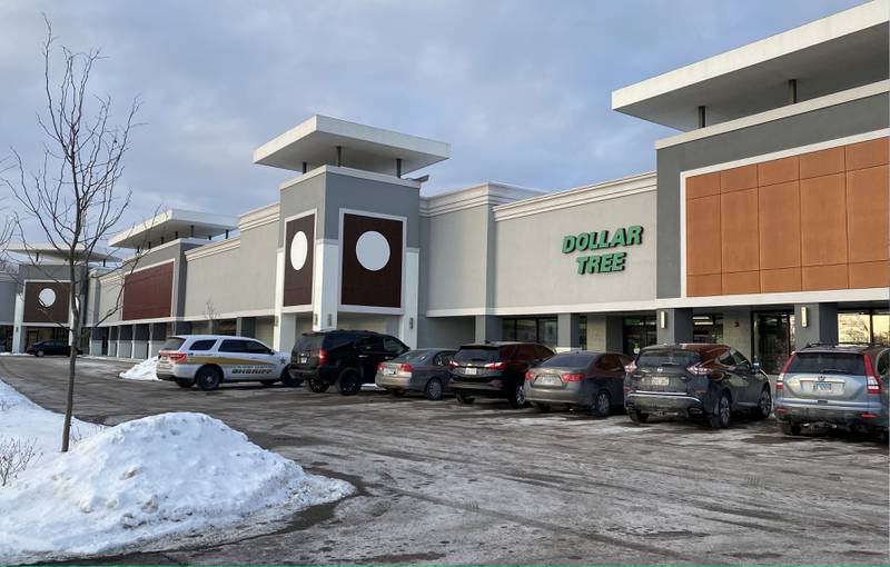 One McHenry County Sheriff's Office vehicle remained outside the Dollar Tree on Algonquin Road in Algonquin on Thursday, Jan. 27, 2022, after the agency advised of a large police presence and asked people to avoid the area,