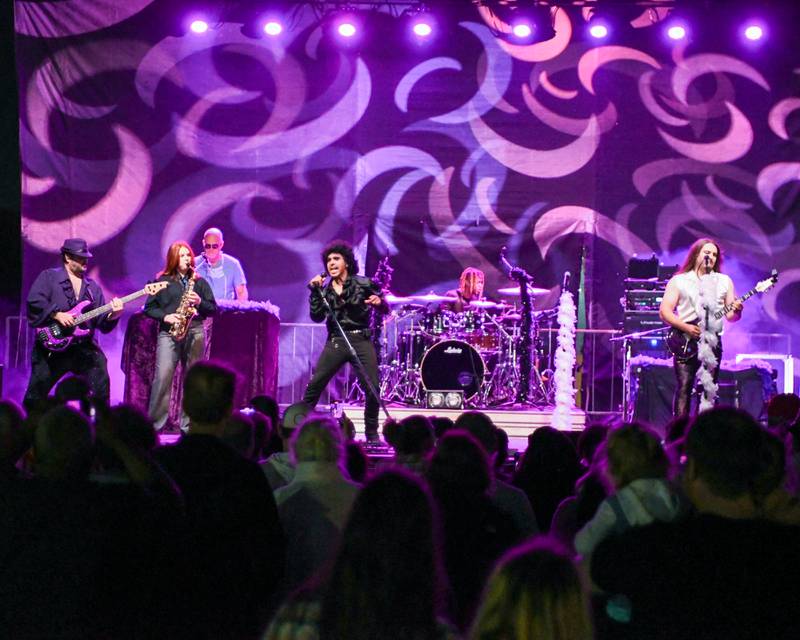 Prince tribute band The Prince Experience performs during PrairieFest on Thursday June 12, 2025, held at PrairieFest Park in Oswego.