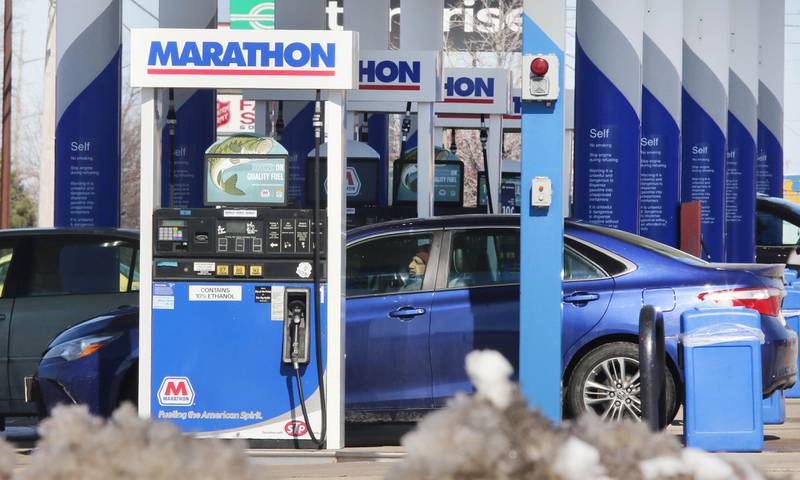 Cars pull in to fill up at the Marathon at 1734 Sycamore Road in DeKalb Tuesday, March 8, 2022, where gas was $4.59 for a gallon of regular unleaded gasoline. US gas prices hit an all time high this week.