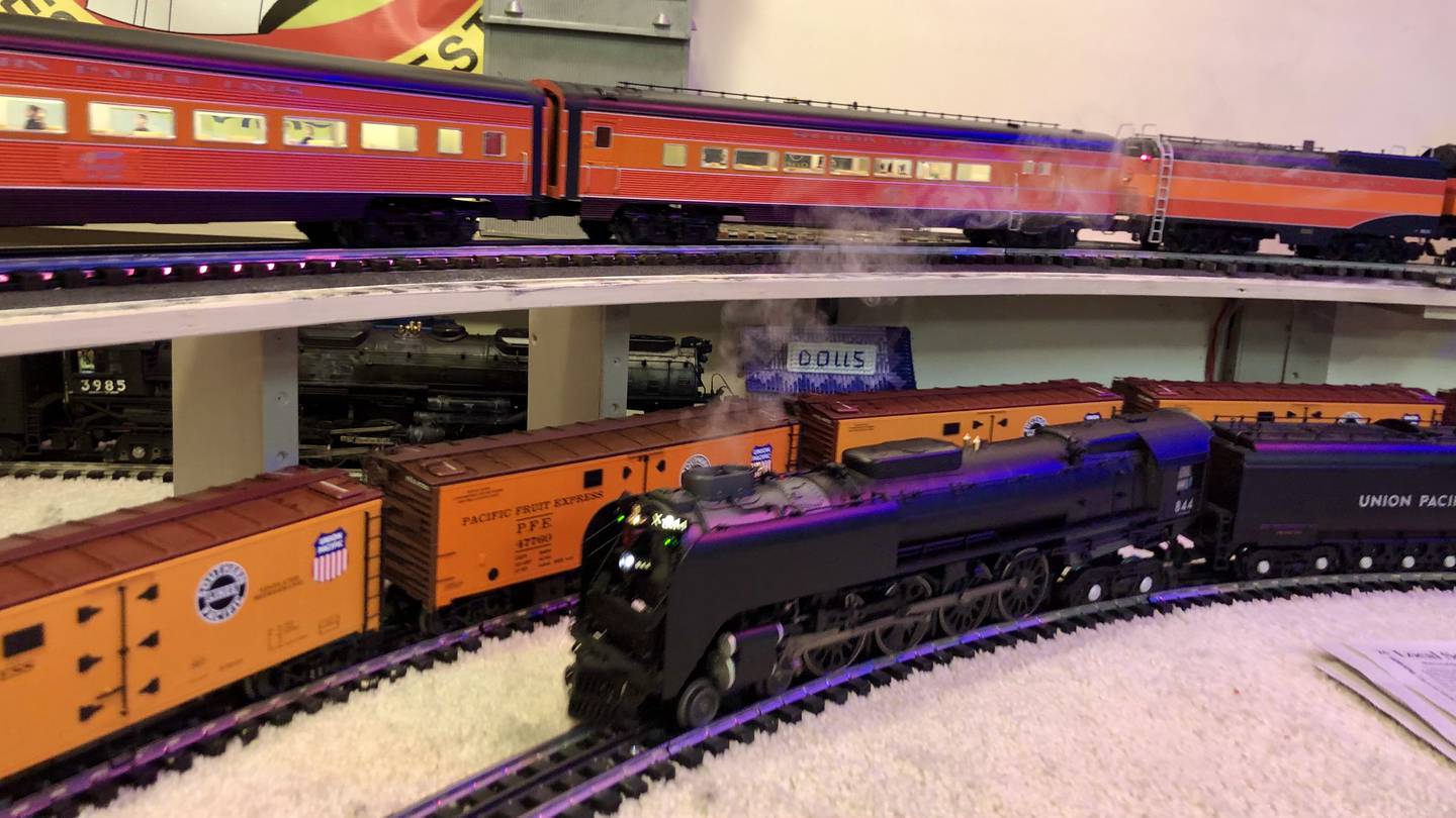 Model trains can run several different tracks around the Werderich basement.