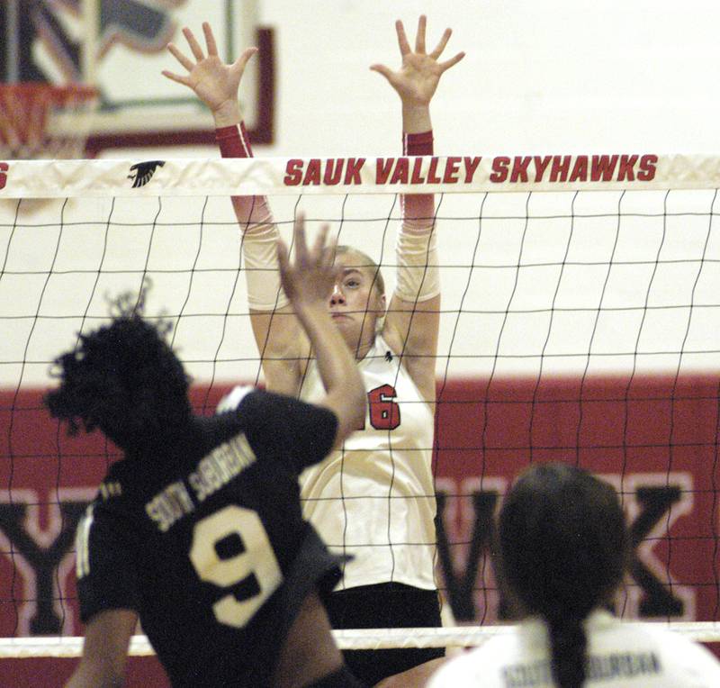 SVCC player Claire Reymer blocks a shot from South Suburban's Virginia Flores-Chappottin. Sauk Valley College beat South Suburban College in three sets Wednesday, November 6, 2024 at Sauk Valley Community College.