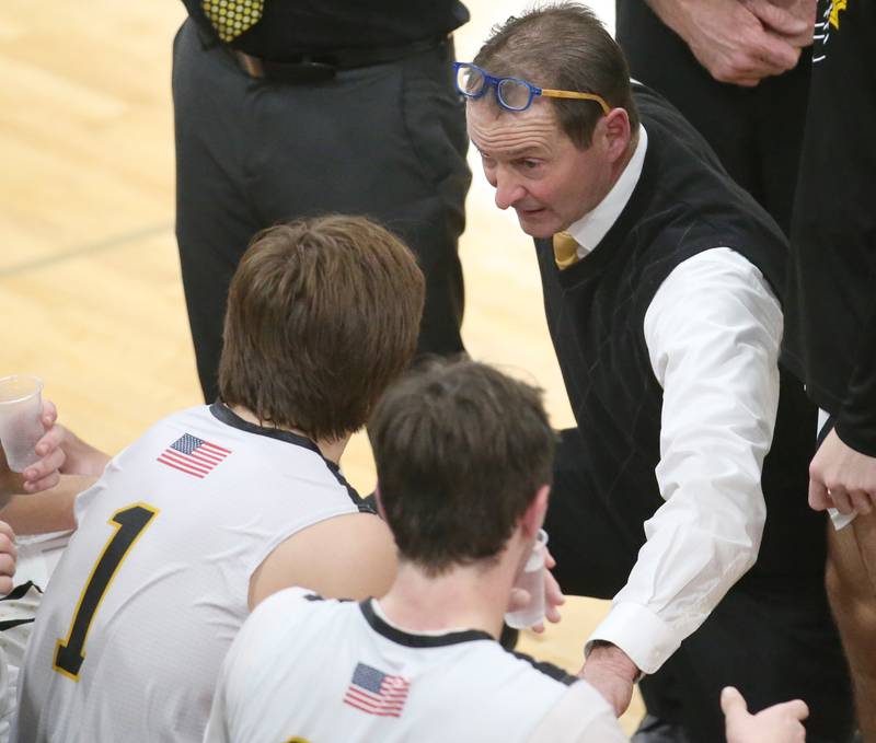Putnam County head boys basketball coach Harold Fay talks to his team during a timeout on Tuesday, Feb. 7, 2023 at Putnam County High School.