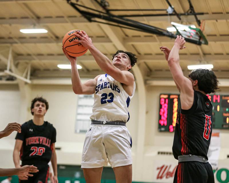 St. Francis Mark Blaskovits (23) goes up for a layup during their Jack Tosh Holiday Classic basketball tournament game between St Francis at Yorkville Thursday Dec 26, 2024 in Elmhurst.