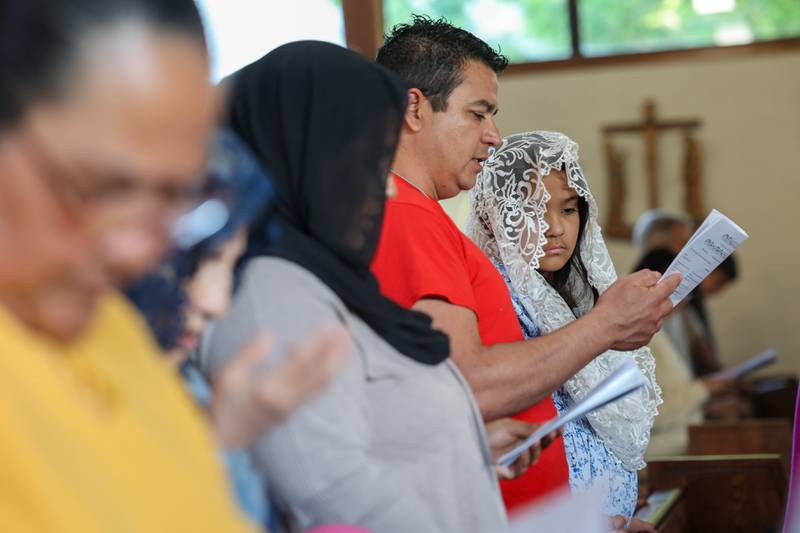 Parishioners pray at St. John Paul II Catholic Church during the National Eucharistic Pilgrimage service in Kankakee on Sunday, May 18, 2025.