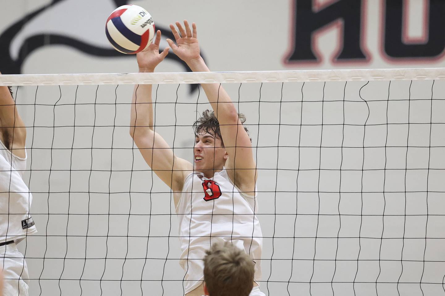 Bolingbrook’s Charlie Bialek blocks a shot against Lincoln-Way Central on Tuesday May 7, 2024 in New Lenox.