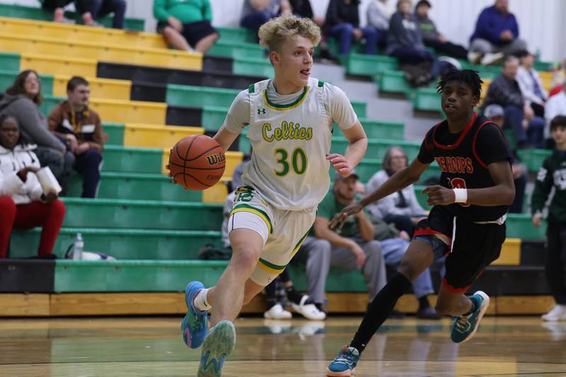 Providence’s Seth Cheney drives along the baseline against Eisenhower on Wednesday 1st, 2023.