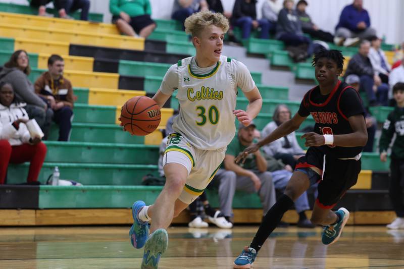 Providence’s Seth Cheney drives along the baseline against Eisenhower on Wednesday 1st, 2023.