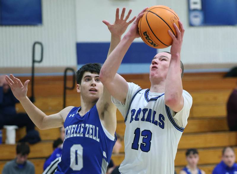 Hinckley-Big Rock's Jacob Orin goes to the basket against Rochelle Zell’s Nitai Gorlin during their game Tuesday, Dec. 17, 2024, at Hinckley-Big Rock High School.