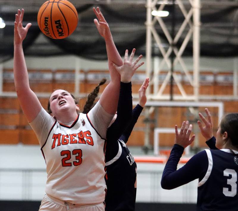 Crystal Lake Central’s Leah Spychala grabs a rebound against Cary-Grove in varsity girls basketball on Tuesday, Jan. 7, 2025, at Crystal Lake Central High School in Crystal Lake.