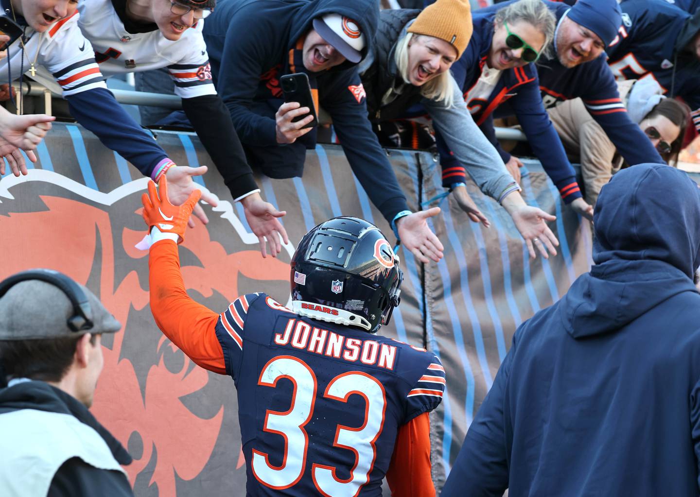 Chicago Bears fans celebrate with cornerback Jaylon Johnson after his second interception during their game against the Las Vegas Raiders Sunday, Oct. 22, 2023, at Soldier Field in Chicago.