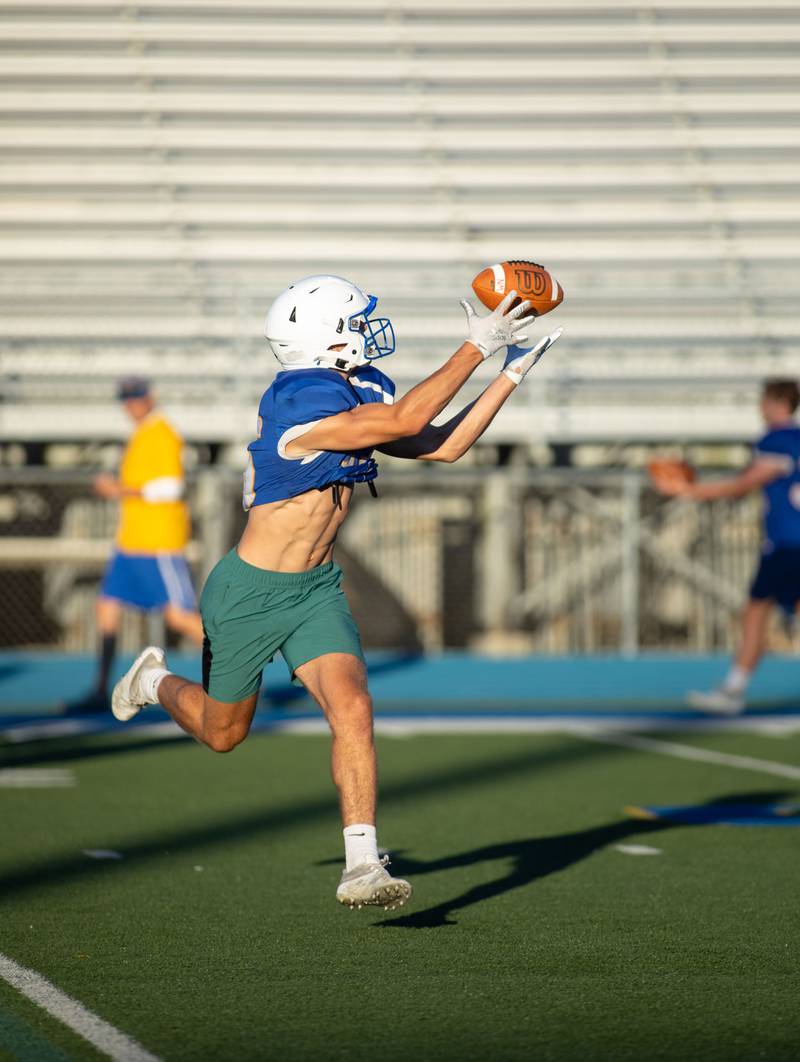 Karsten Libby gets ready to catch the ball during practice at Wheaton North on Thursday, Aug. 11, 2022.