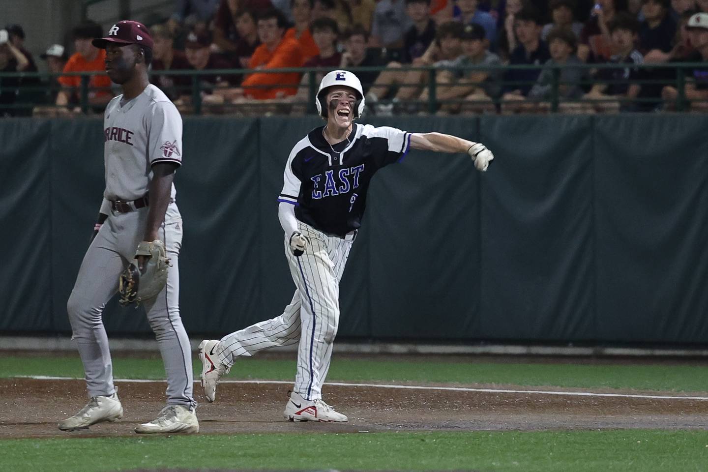 Lincoln-Way East’s Matt Hudik celebrates a 2-run single against Brother Rice in the Class 4A Crestwood Supersectional on Monday, June 5, 2023 in Crestwood.