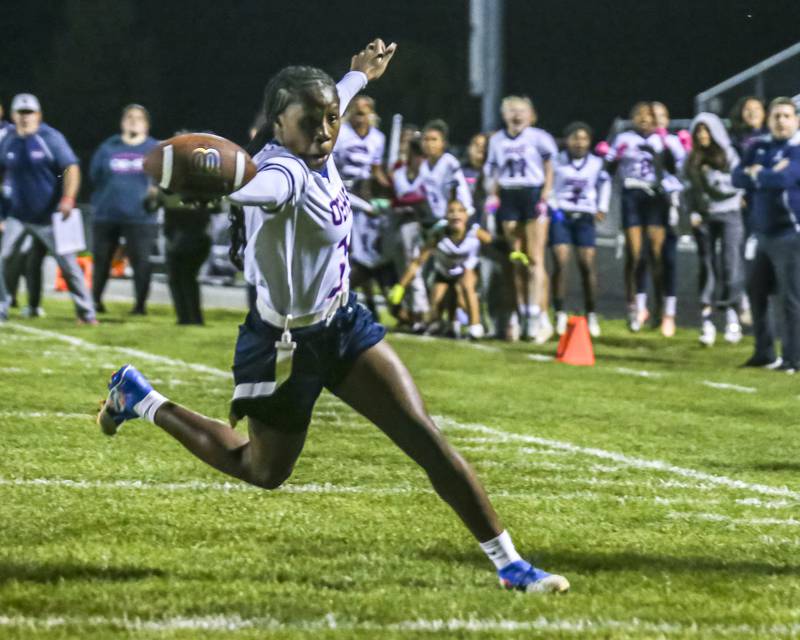 Oswego East's Avaya Kittling-turner (3) runs into the endzone to tie up the game during Oswego East Regional Final flag football game between St. Charles North at Oswego East Thursday, Oct 9, 2025 in Oswego.