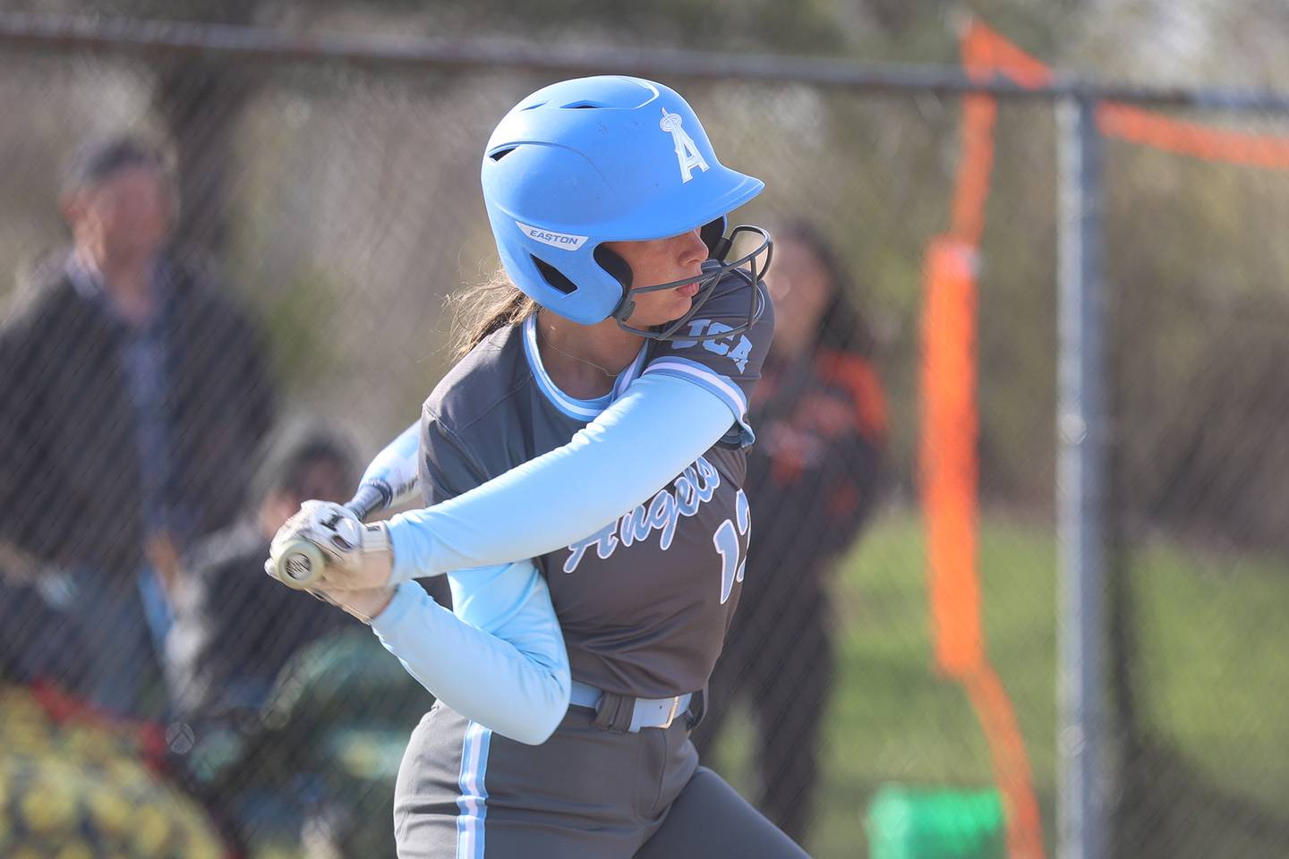 Joliet Catholic’s Emma Mackey connects for a single against Minooka on Tuesday, April 7, 2026 in Minooka.