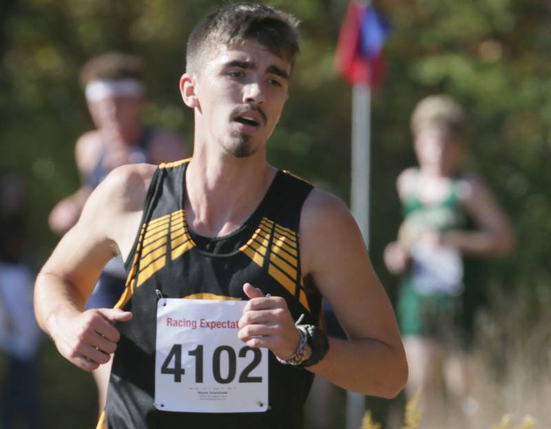 Putnam County's Wyatt Grimshaw runs in the Class 1A Regional Cross Country boys race on Saturday, Oct. 22, 2022 at the Seneca FFA Farm in Marseilles.