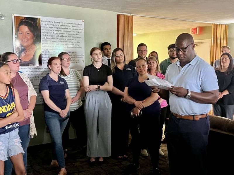Sauk Valley Voices of Recovery's Executive Director Gerald Lott addresses the crowd at Cledy's House of Hope, a new women's sober living facility in Rock Falls.