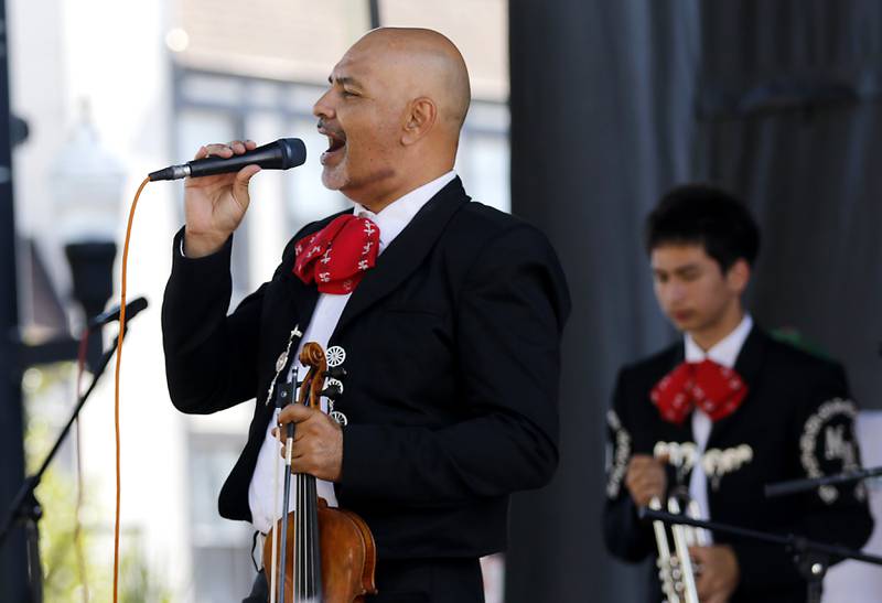 Rodolfo Torres of Mariachi Internacional De Pro sings a song on Sunday, Sept. 14, 2025, during the annual Hispanic Connections Mexican Independence Day Celebration in the Historic Woodstock Square. The celebration featured music, food and culture.
