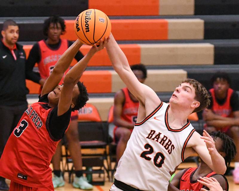 DeKalb's Lukas Stubblefield (20) tries to get a loose ball away from Chicago Bulls Prep's Kevin Smith (3) in the game on Thursday Dec. 26, 2024, during the 97th Chuck Dayton Classic Basketball tournament held in DeKalb.
