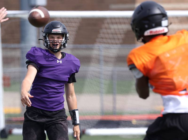 DeKalb’s Carter Guymon throws a pass Wednesday, July 15, 2025, during a summer practice session at the school.