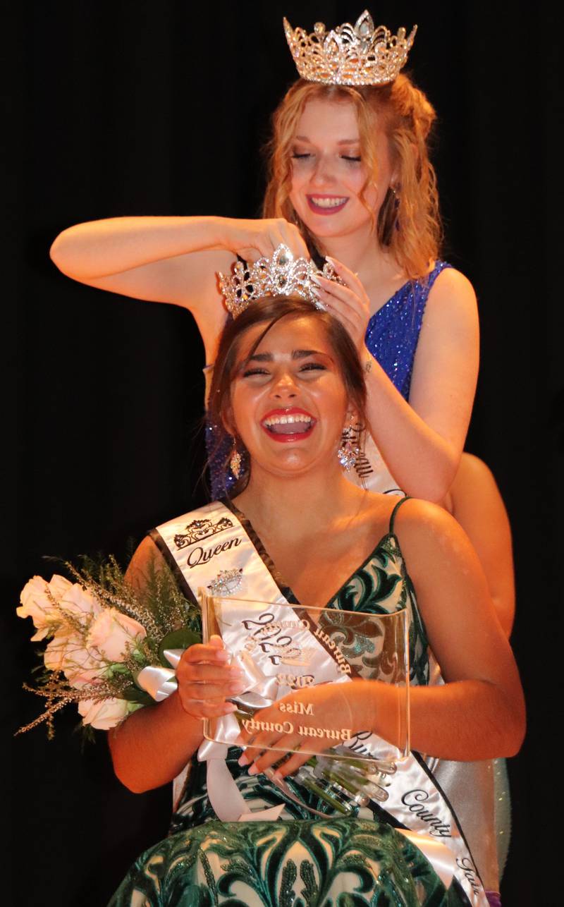 Lexie Marquez, 18, of Wyanet, was crowned Miss Bureau County Fair on Sunday at the Fair Queen Pageant. 
Pinning on her crown is the 2021 Queen Kaitlyn Grabill.
