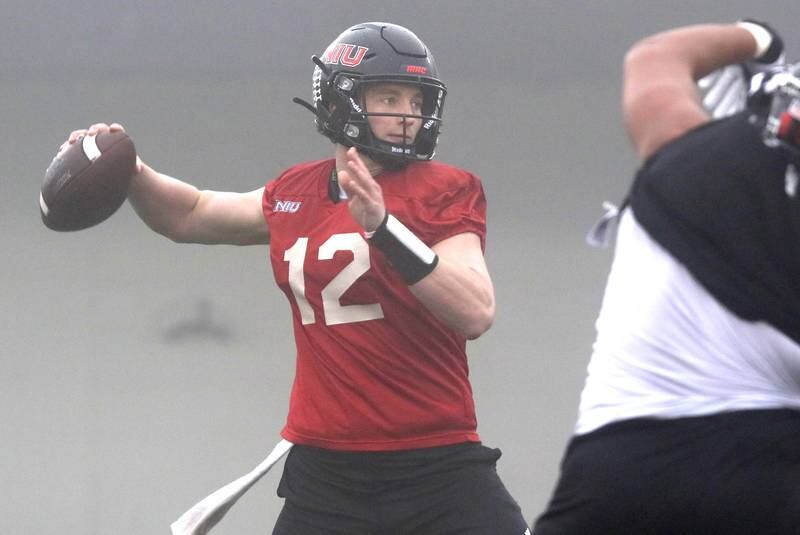 Northern Illinois University quarterback Rocky Lombardi throws a pass during spring practice Wednesday, March 23, 2022, in Huskie Stadium at NIU in DeKalb.