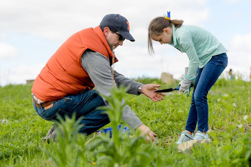 Max and Eliana Bowgren of Daisy Troop 897 in Geneva help with the planting of native prairie plants at Peck Farm’s Dolomite Prairie as part of Geneva’s Earth Day Celebration on Saturday, April 20, 2024.