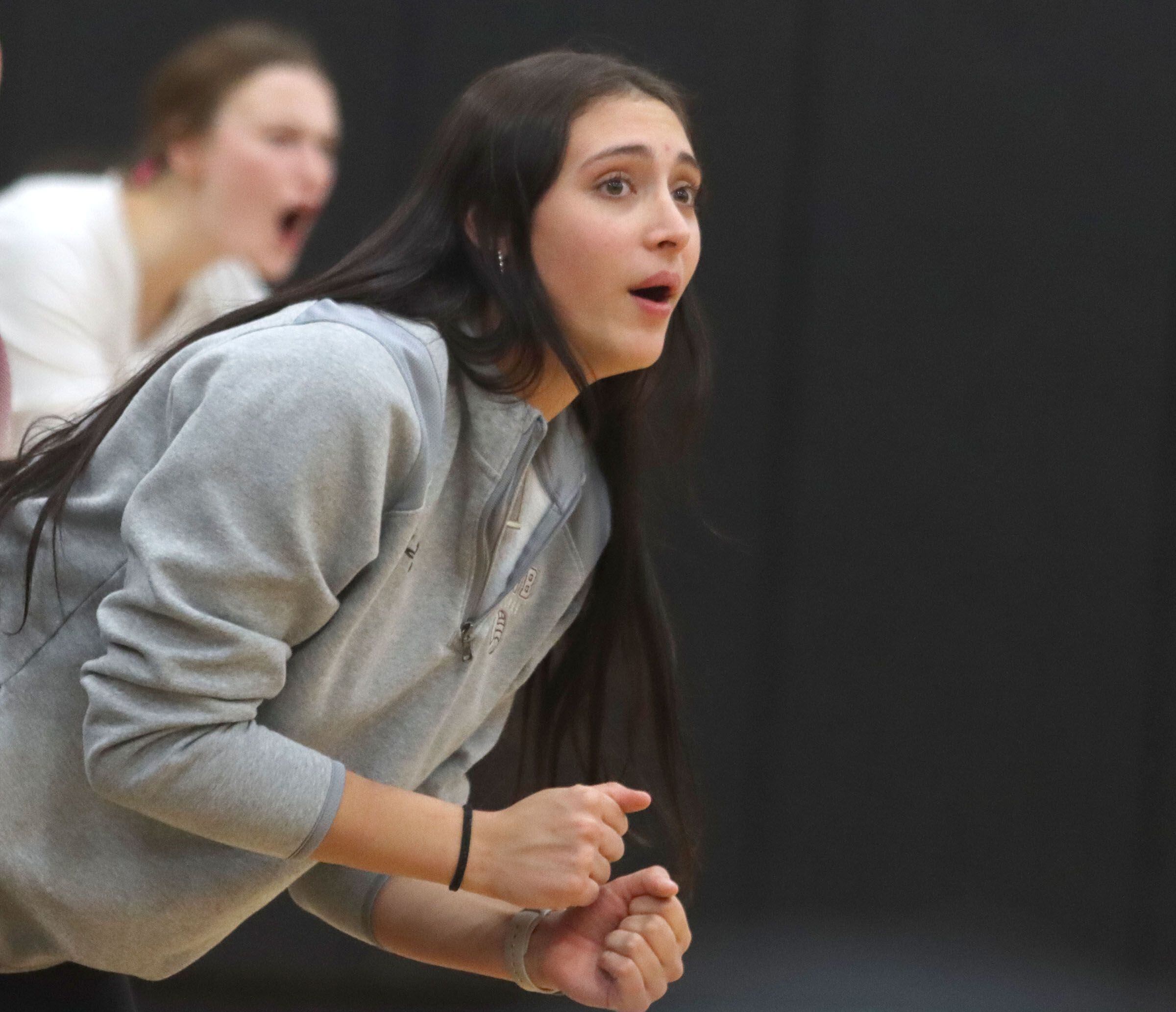 ]Prairie Ridge’s Maizy Agnello keeps a close eye on the action as the Wolves polish off a three-set win over St. Viator in IHSA Class 3A Super-Sectional girls volleyball at Streamwood High School in Streamwood on Monday, November 10, 2025.