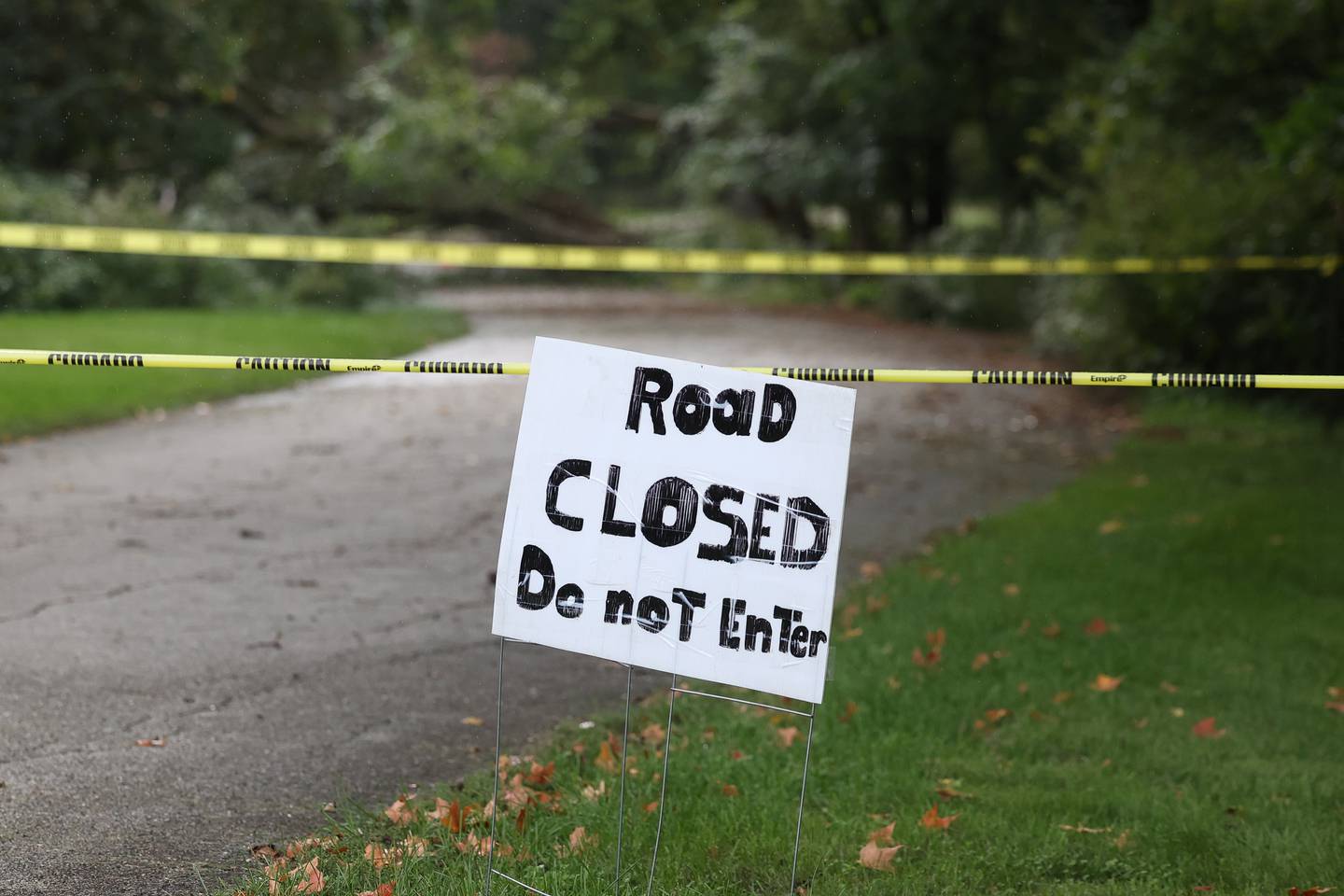Woodland Memorial Park II entrance remains close due to heavy rains causing road erosion and a downed tree on Tuesday, Sept. 26, 2023 in Joliet.