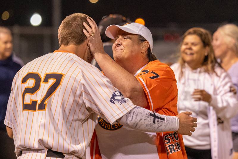 Senior Tyler Dorsch of the Pistol Shrimp is embraced by his mother Vicki after playing his final game as a part of the team on Thursday, July 31, 2025, at Schweickert Stadium in Peru.
