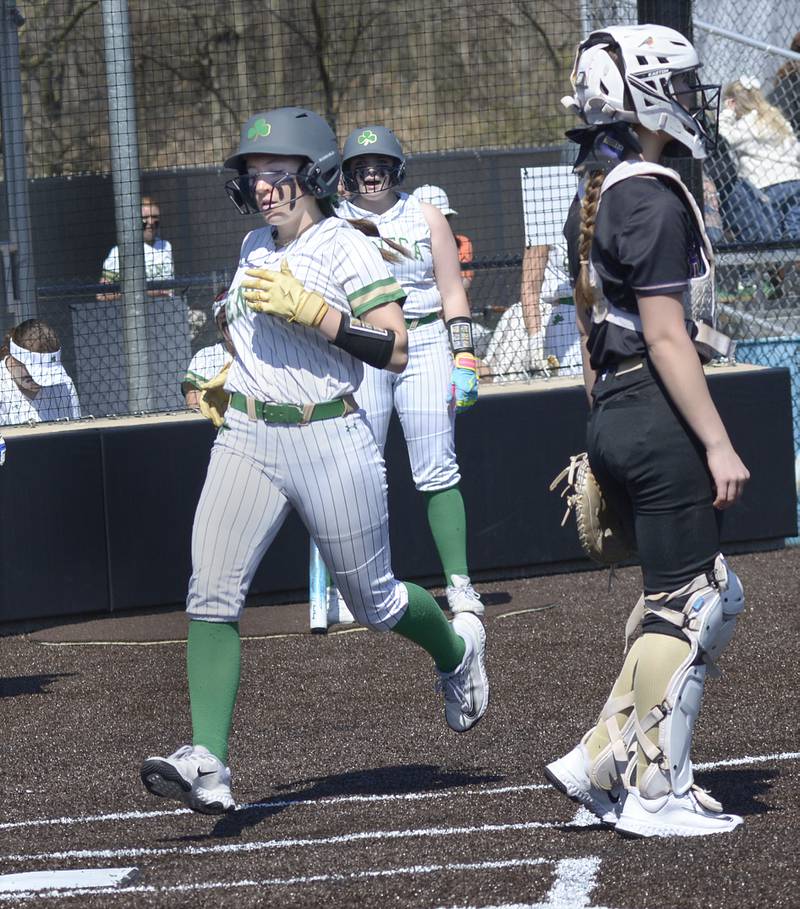 Seneca’s Alyssa Zellers sets to cross the plate scoring Seneca’s first run against Serena Saturday at Seneca.