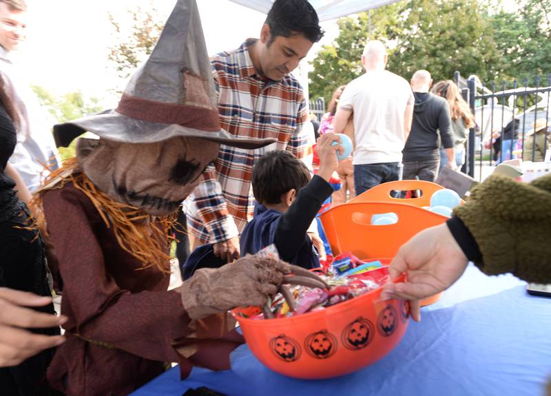 Children including Saboor Khan of Villa Park trick or treating through Safety Town and Wild Meadows during the Elmhurst Park District Family Fall Fest Saturday, Oct. 5, 2024.