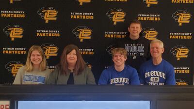 Connor Brooker signs to wrestle for the University of Dubuque