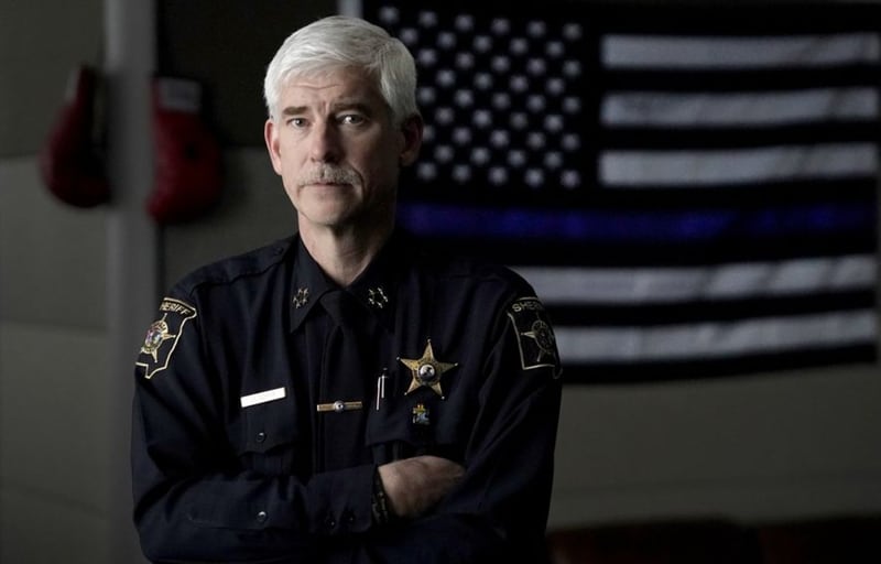 DuPage County Sheriff James Mendrick faced harsh criticism Tuesday from some county board members and residents over his remarks about enforcing the state's new ban on certain firearms. )Associated Press file photo)