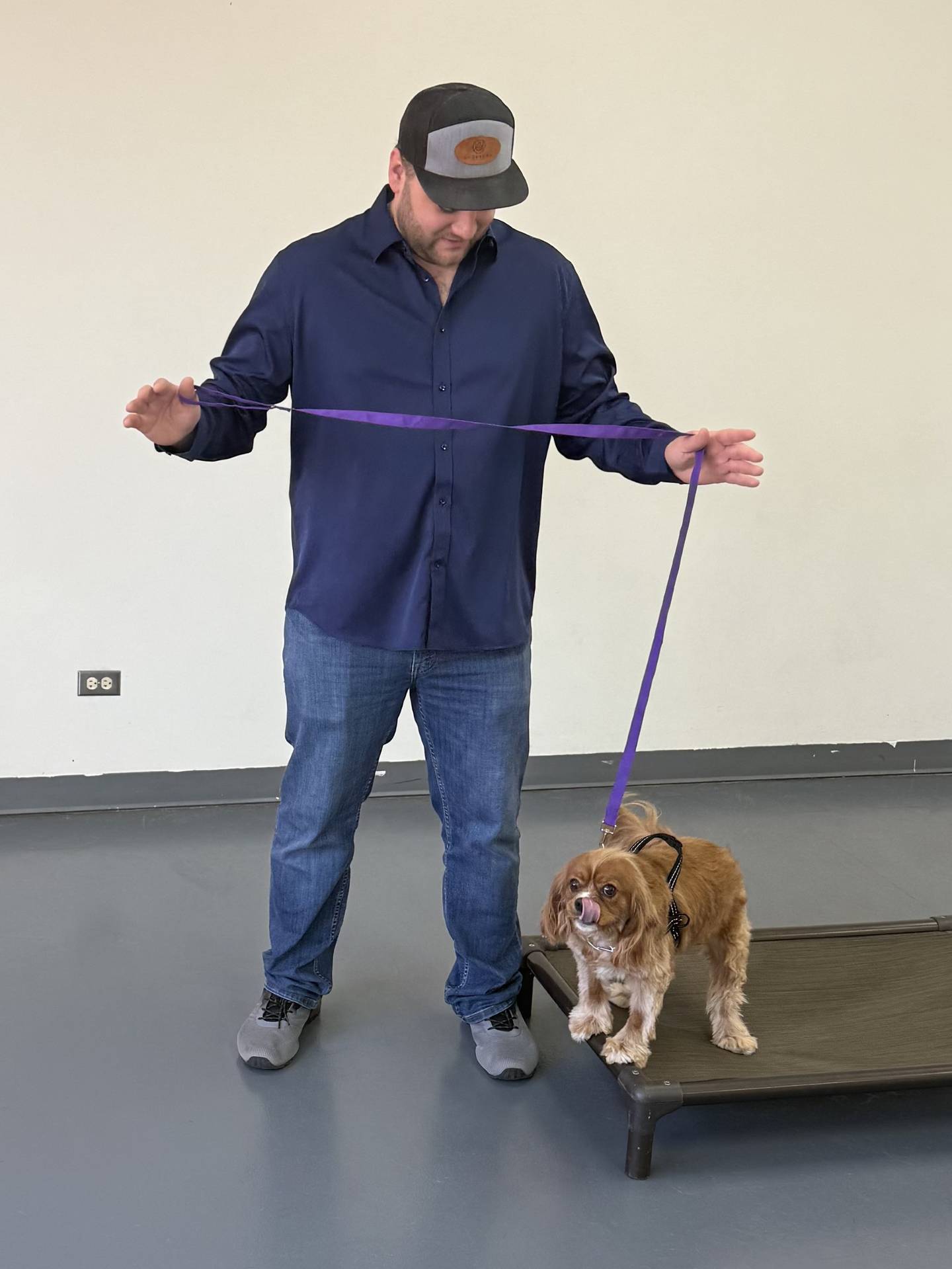 Zachary Holland, owner of Underdog Academy in Algonquin, training Vinnie on March 27, 2026