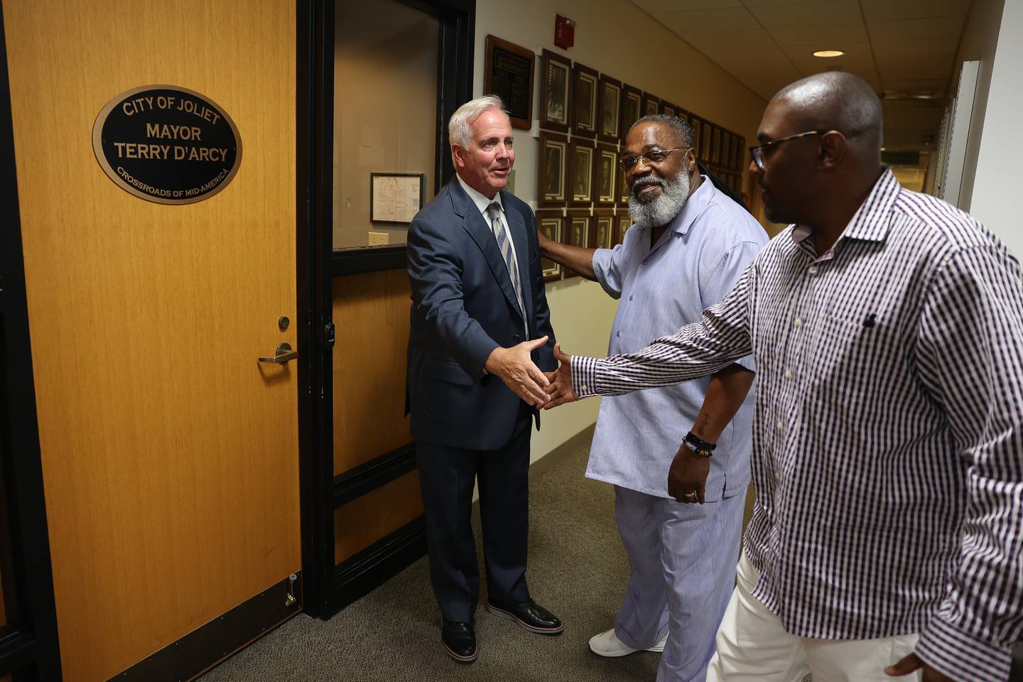 Mayor Terry D’Arcy, left, meets with Bishop Steve Evans and community activist Jaron Nabors at City Hall on Friday, Aug. 11, 2023 in Joliet.