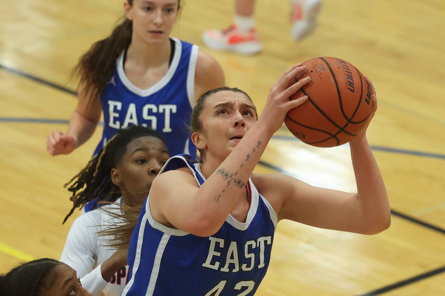 Lincoln-Way East’s Hayven Smith goes in for the basket against Romeoville in the Sandburg Holiday Classic semifinal on Thursday, Dec. 28th, 2023 in Orland Park.