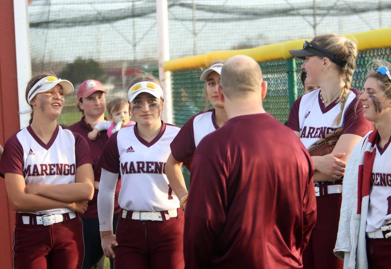 Marengo head coach Dwain Nance speaks to his players after a win over Richmond-Burton in varsity softball at Marengo Tuesday.